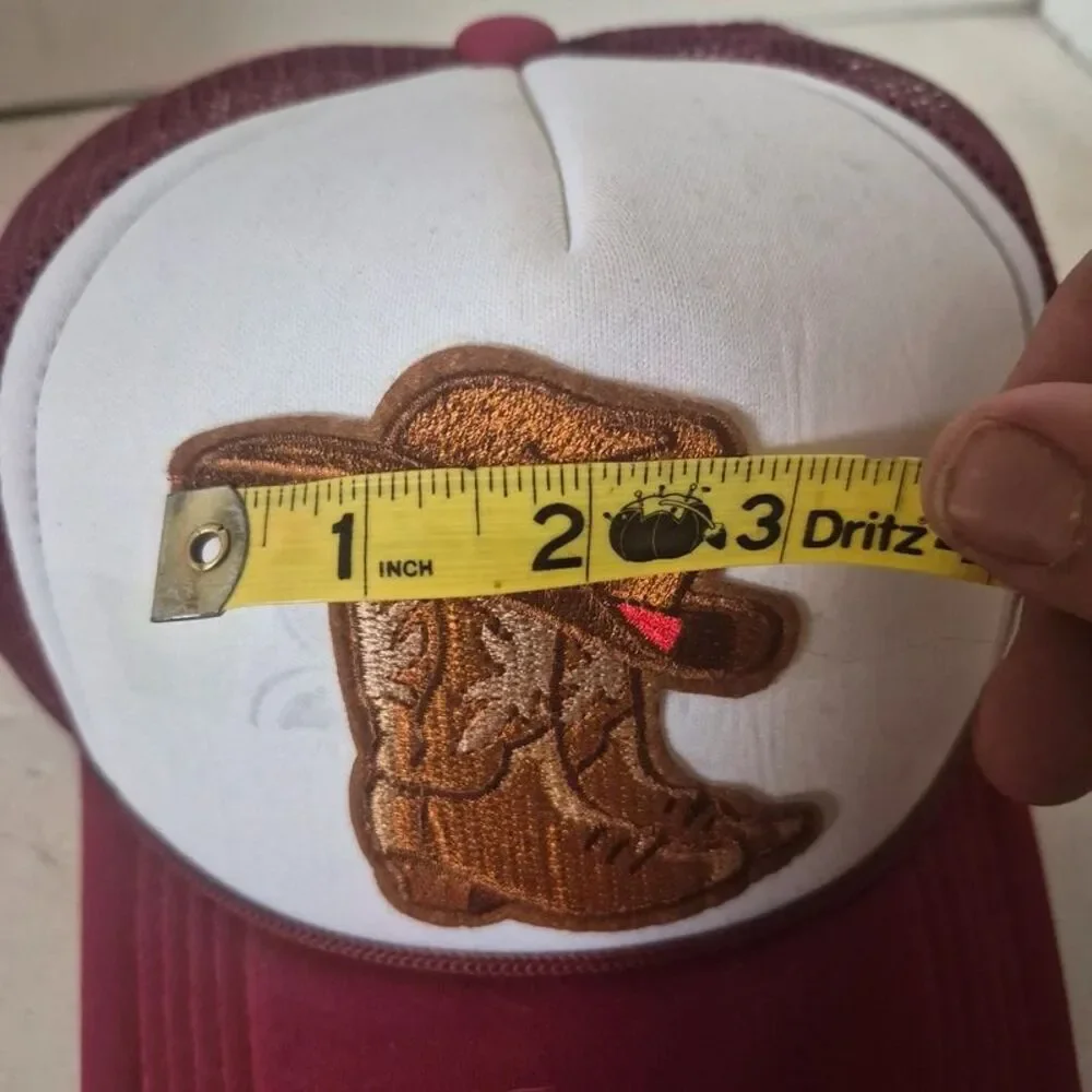 Red polyester mesh trucker hat with cowboy hat/boots iron on
